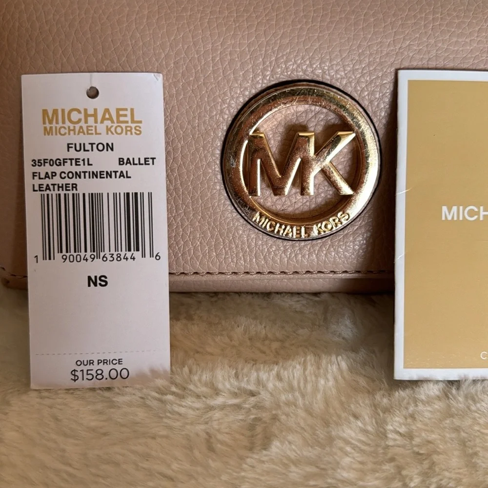 NWT-Michael Kors leather Fulton wallet. Color is call Ballet ( pale pink)